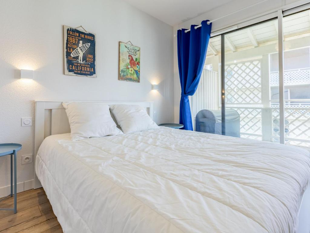 Postel nebo postele na pokoji v ubytování Apartment Les balcons des pêcheurs C25 by Interhome