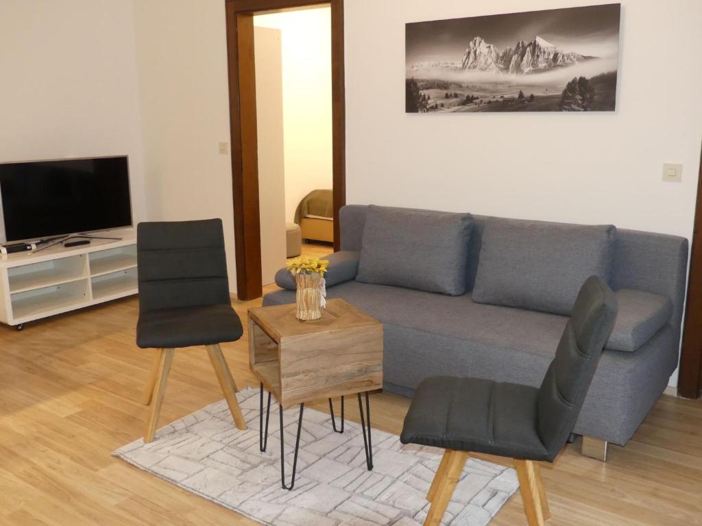 A television and/or entertainment centre at Apartment Sigel by Interhome