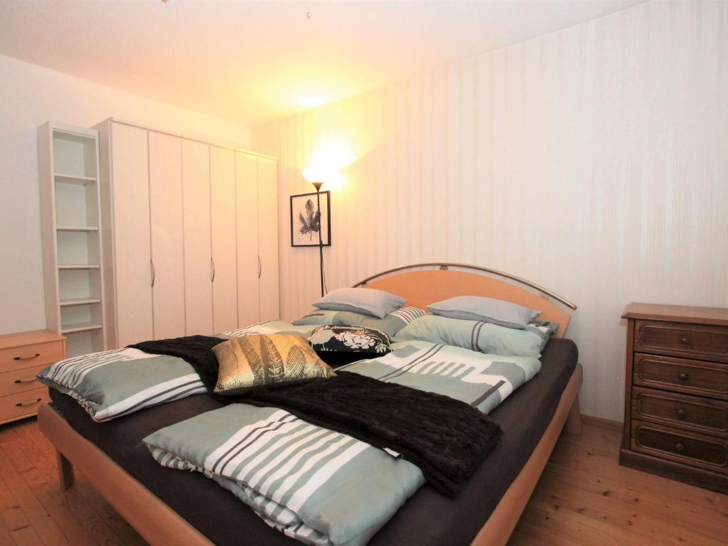 Posteľ alebo postele v izbe v ubytovaní Apartment Evelyne by Interhome