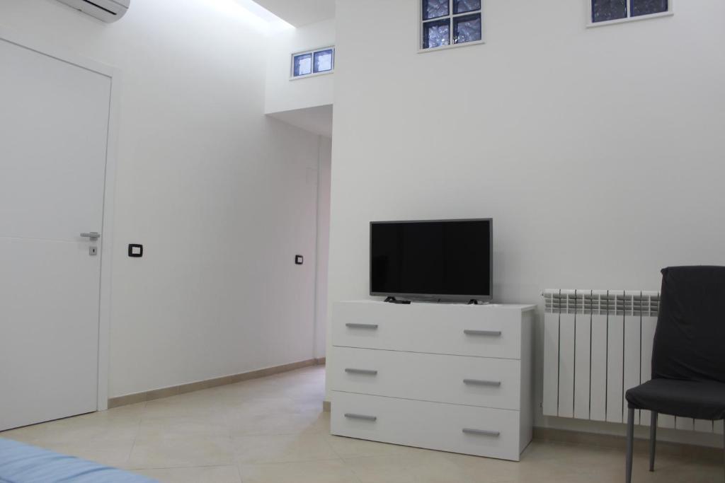 Telewizja i/lub zestaw kina domowego w obiekcie Agorà-Akrai B&B