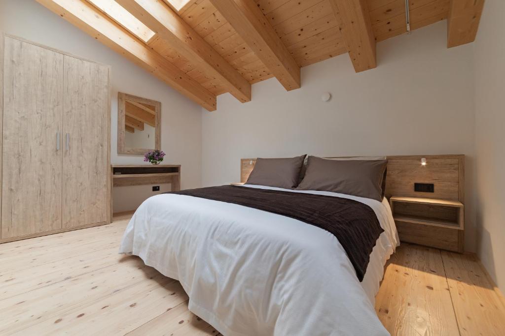 Postel nebo postele na pokoji v ubytování Tenuta Grimaldi Wine Resort