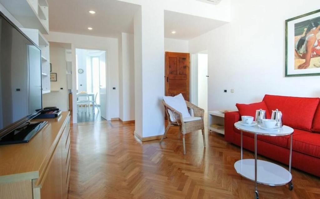 A television and/or entertainment centre at Conca Del Naviglio by Halldis