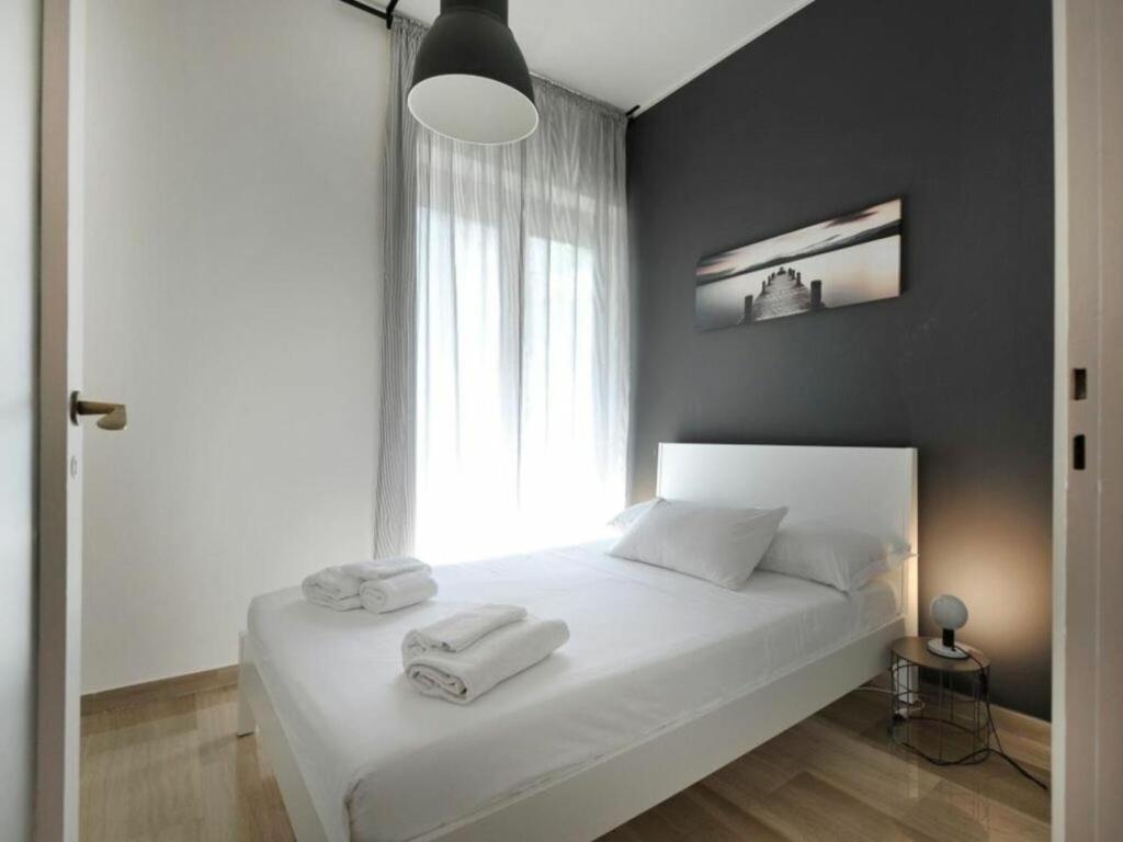 A bed or beds in a room at Alberto Mario by Halldis