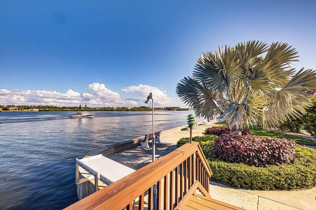 a view of a river with a boat on it at Harbor Tower Intracoastal Condo in Siesta Key