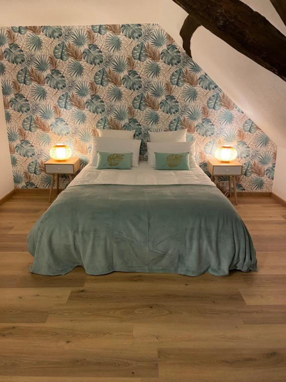 Postel nebo postele na pokoji v ubytování La Charmeraie : gîte de charme, piscine et spa