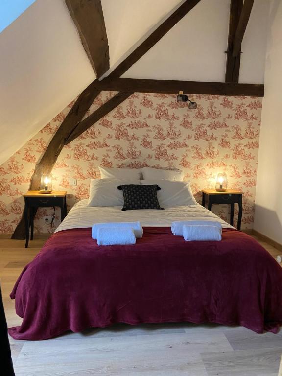 Postel nebo postele na pokoji v ubytování La Charmeraie : gîte de charme, piscine et spa