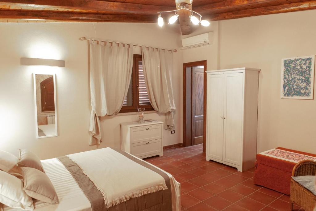 Postel nebo postele na pokoji v ubytování B&B Lucamaria