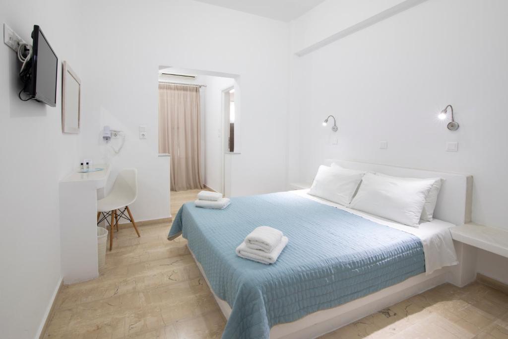 Postel nebo postele na pokoji v ubytování Evas House