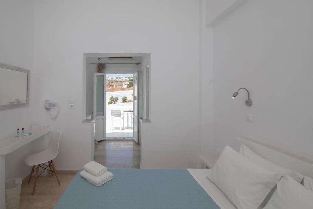 Postel nebo postele na pokoji v ubytování Evas House