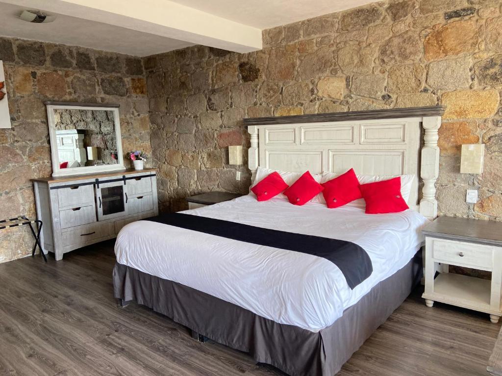 Postel nebo postele na pokoji v ubytování Vista Zacatlan Hotel
