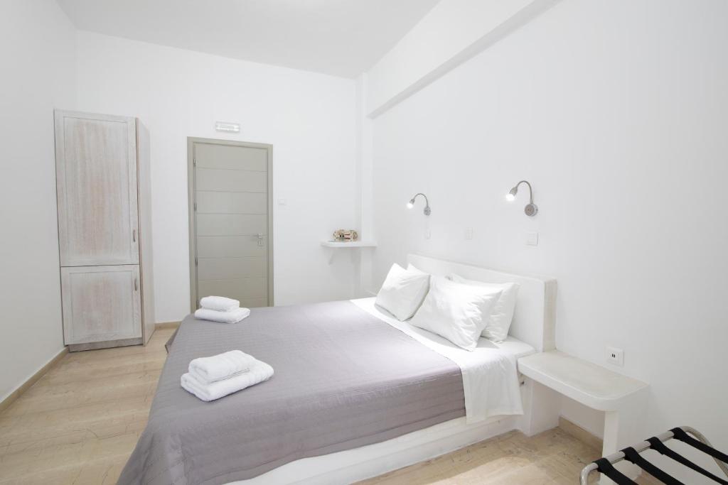 Postel nebo postele na pokoji v ubytování Evas House