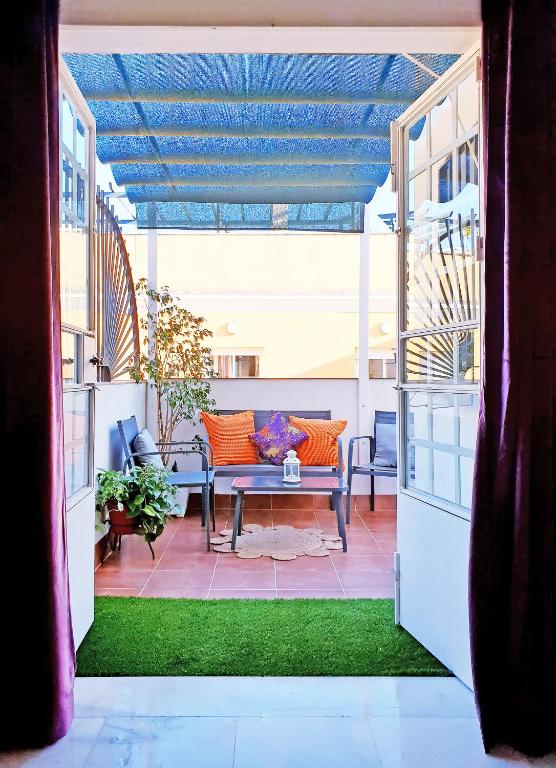 Balkón nebo terasa v ubytování ATICO CON TERRAZA PRIVADA
