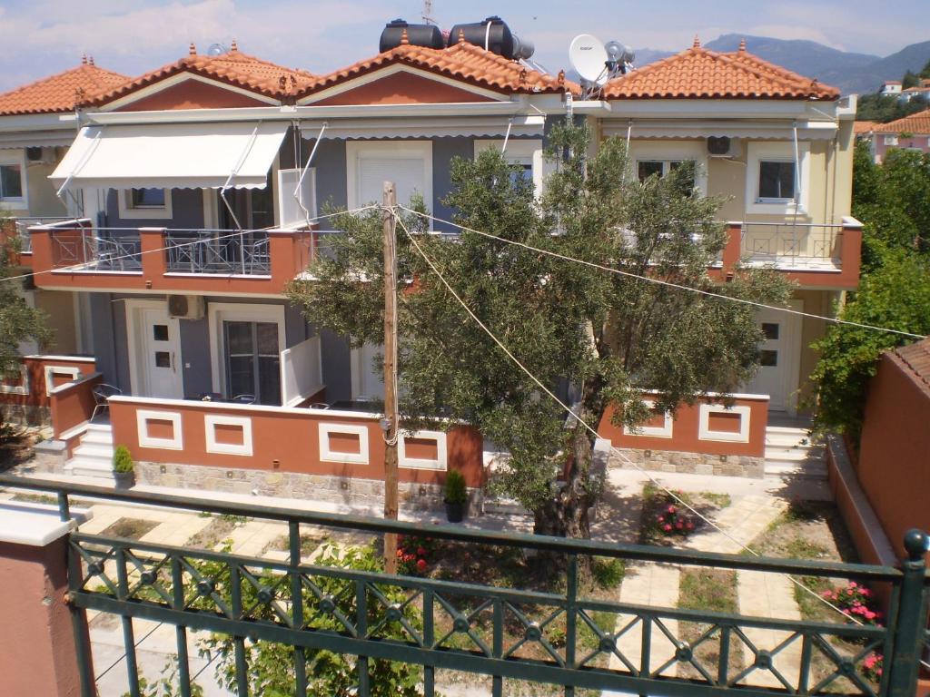 a view from the balcony of a house at Irini Apartments Anaxos in Anaxos