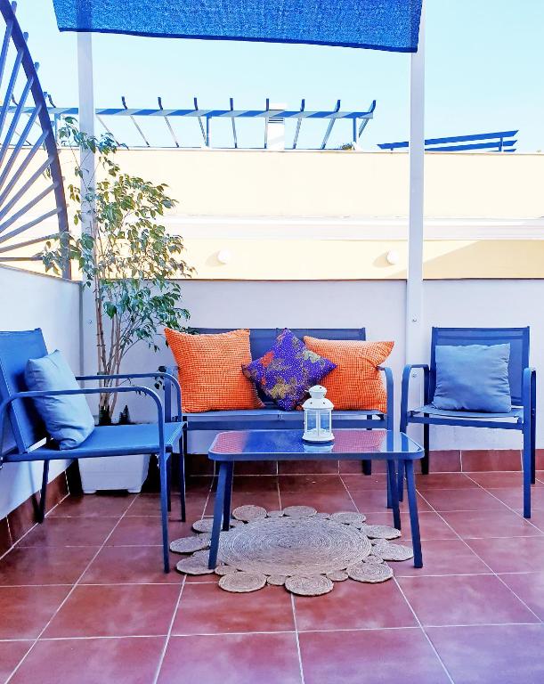Posezení v ubytování ATICO CON TERRAZA PRIVADA