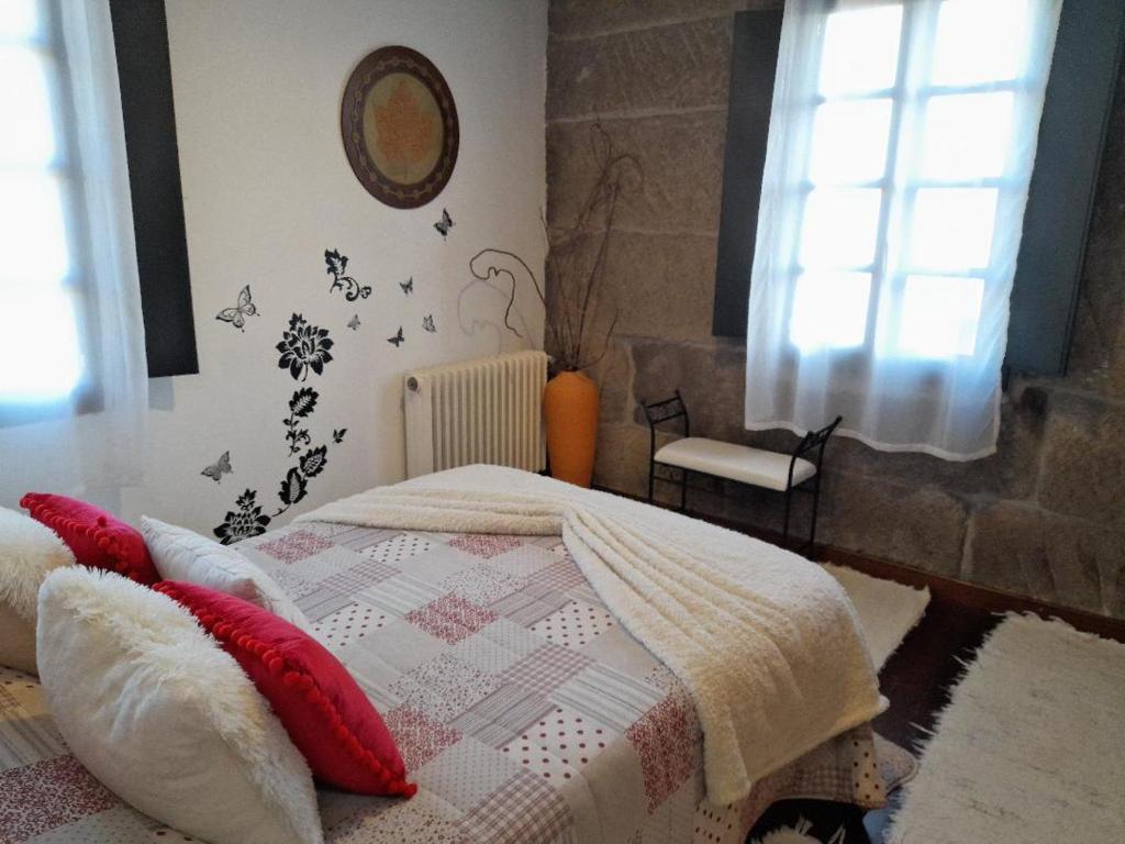 Postel nebo postele na pokoji v ubytování Caserio de Fontes