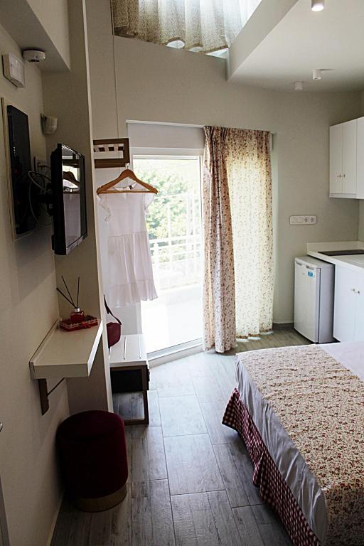 Posteľ alebo postele v izbe v ubytovaní Anastasia Mare Luxury