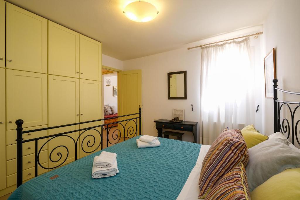 Postel nebo postele na pokoji v ubytování Stella Di Mare holiday house