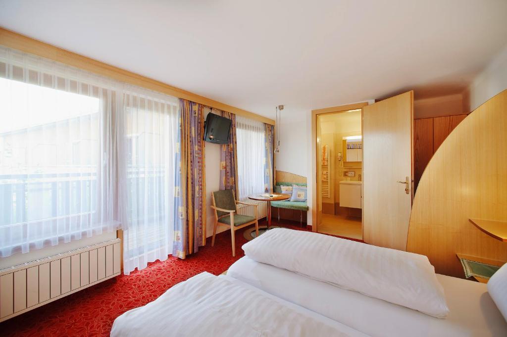 Letto o letti in una camera di Finkensteiner Hof
