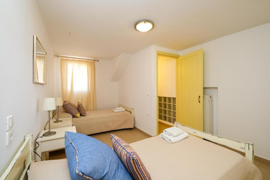 Postel nebo postele na pokoji v ubytování Stella Di Mare family house