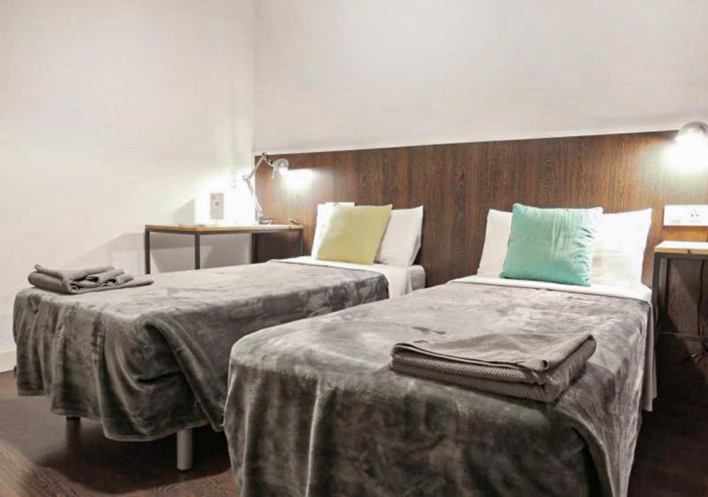Postel nebo postele na pokoji v ubytování Traveller House