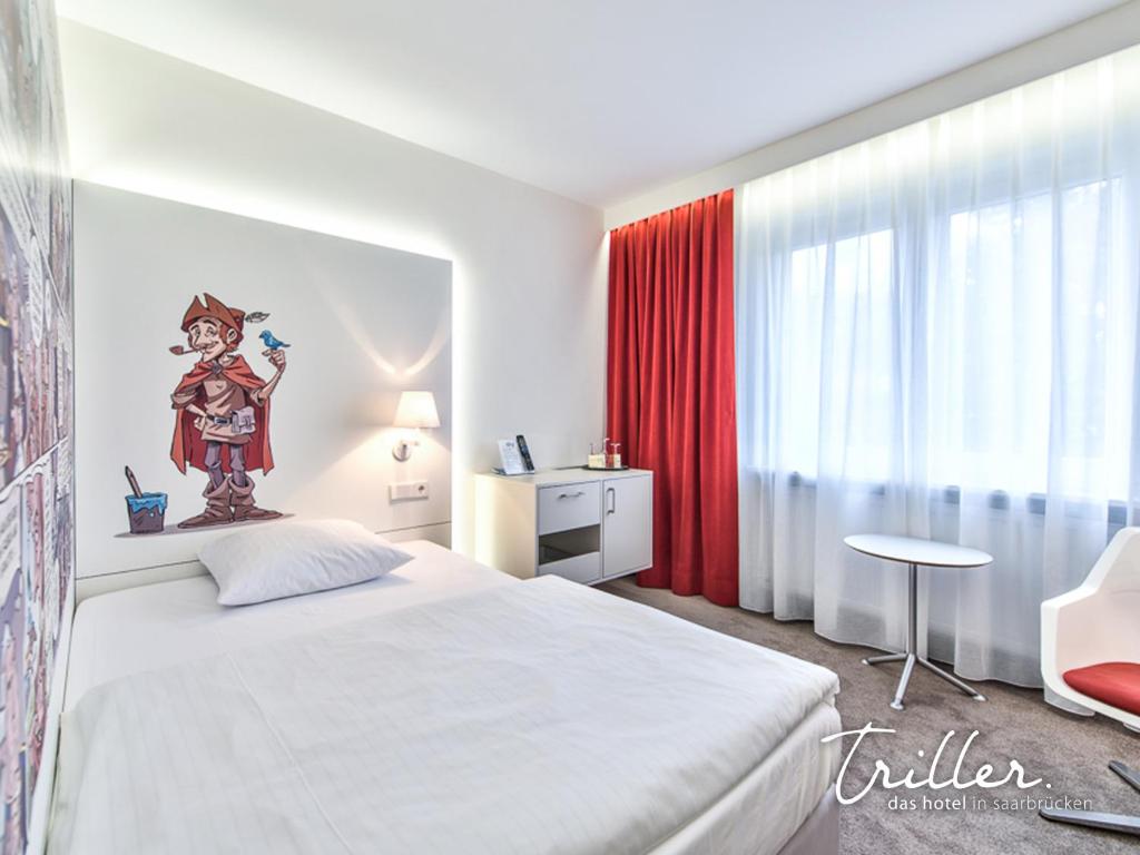 Postel nebo postele na pokoji v ubytování Hotel Am Triller - Hotel & Serviced Apartments