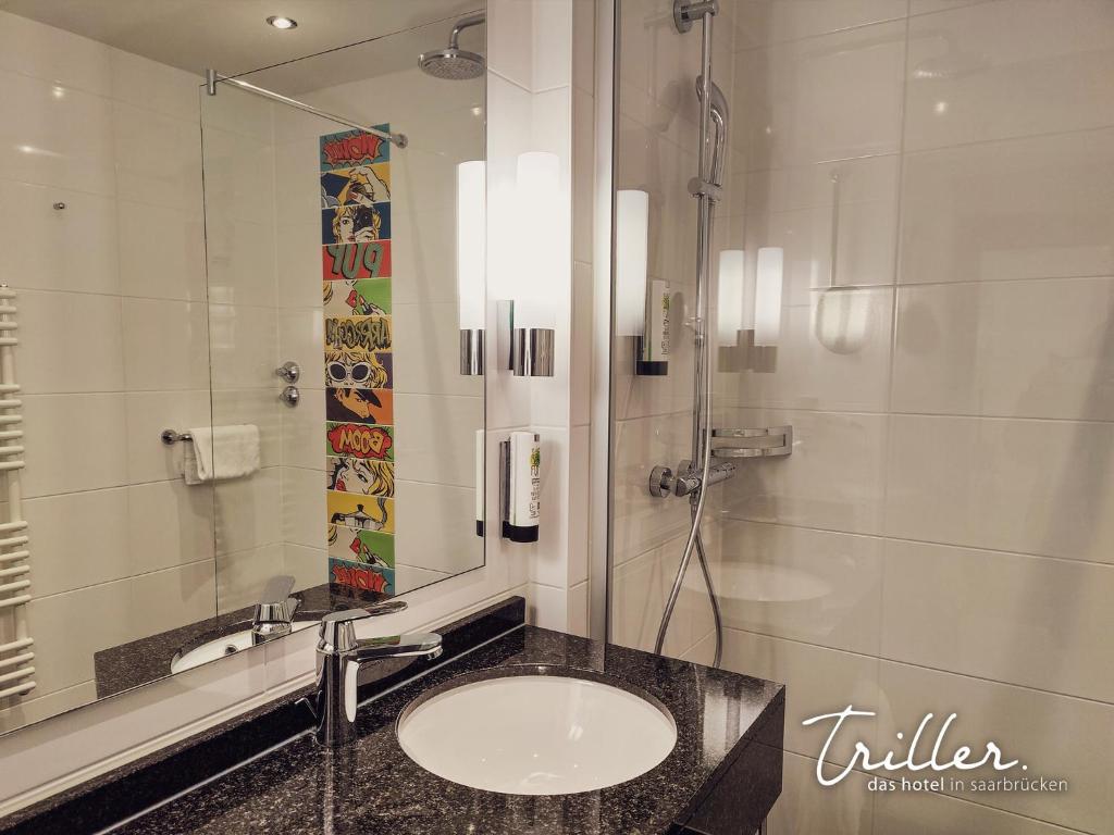 Koupelna v ubytování Hotel Am Triller - Hotel & Serviced Apartments