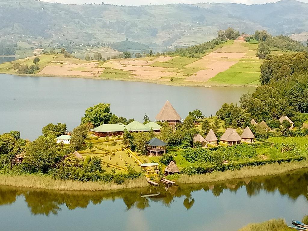 an aerial view of a resort on an island in a lake at Paradise Eco-Hub in Kabale