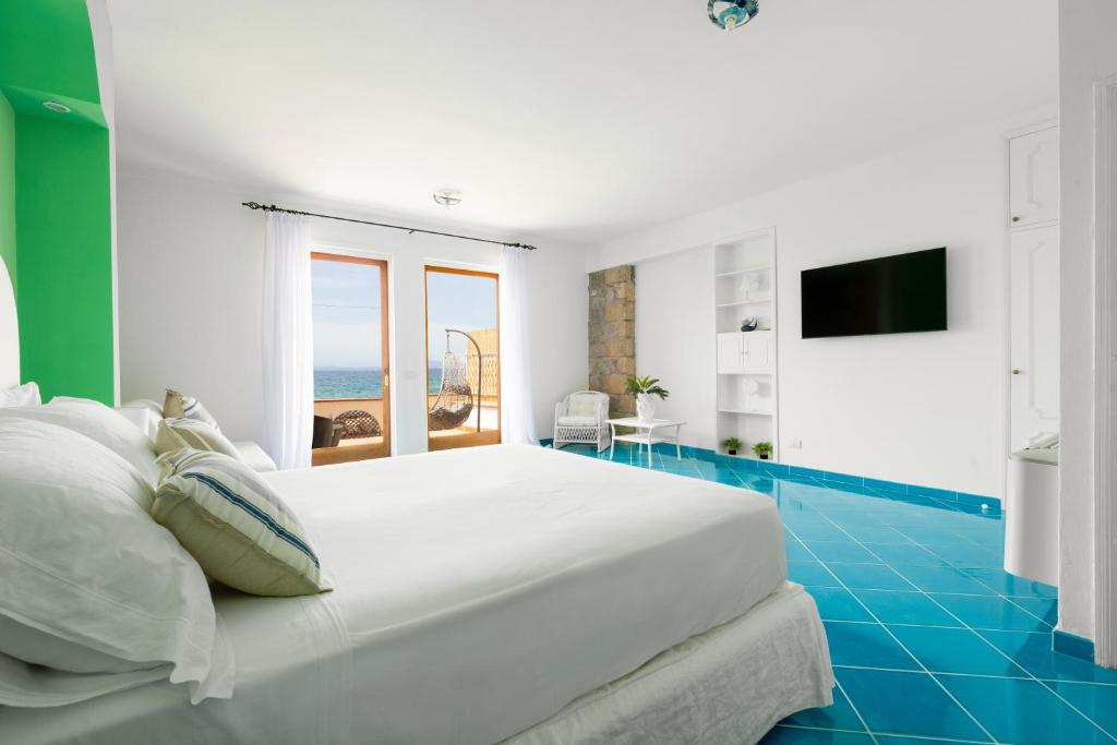 A bed or beds in a room at Villa Buon Gesu'