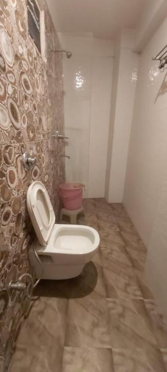 Koupelna v ubytování Amax Inn