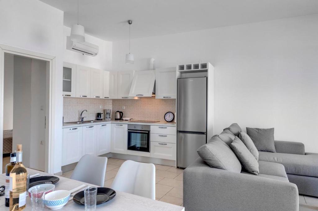 Kuchyň nebo kuchyňský kout v ubytování Waterview Apartments