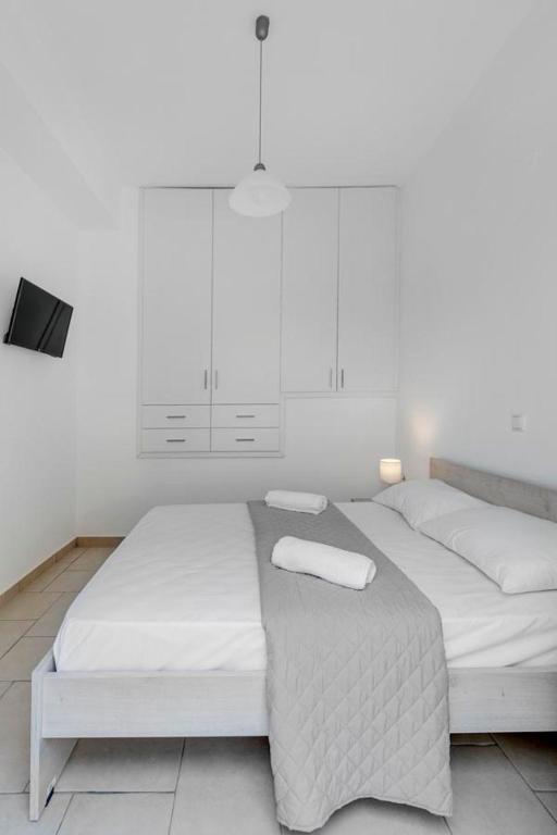 Postel nebo postele na pokoji v ubytování Waterview Apartments