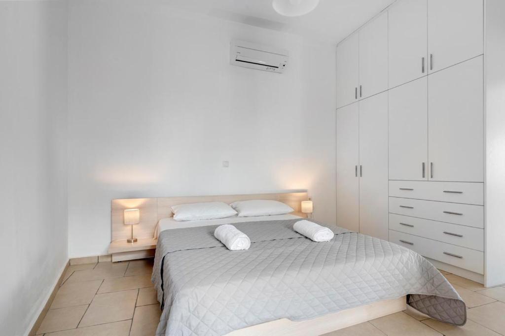 Postel nebo postele na pokoji v ubytování Waterview Apartments