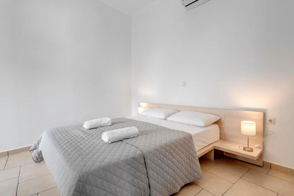 Postel nebo postele na pokoji v ubytování Waterview Apartments