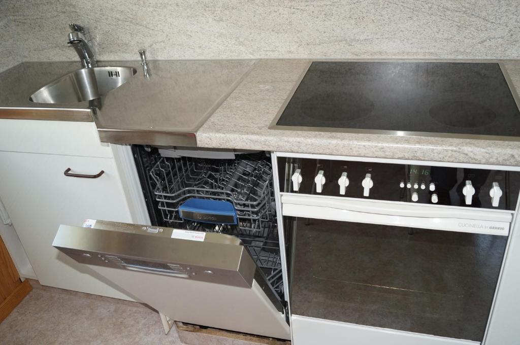 Kuchyň nebo kuchyňský kout v ubytování Ferienhaus Schils