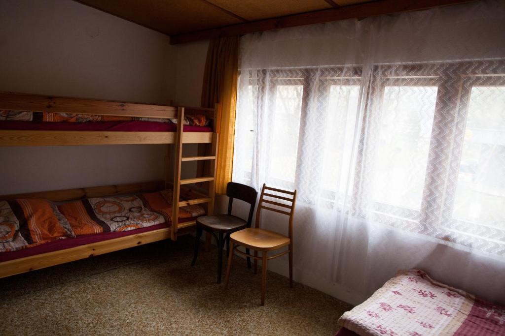 Postel nebo postele na pokoji v ubytování Galerka Líšný