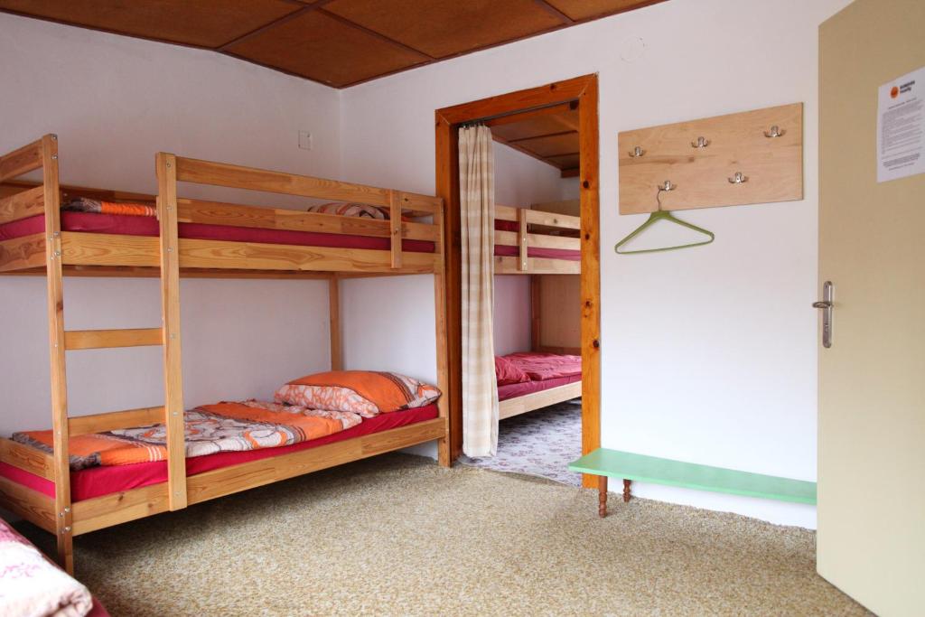 Postel nebo postele na pokoji v ubytování Galerka Líšný