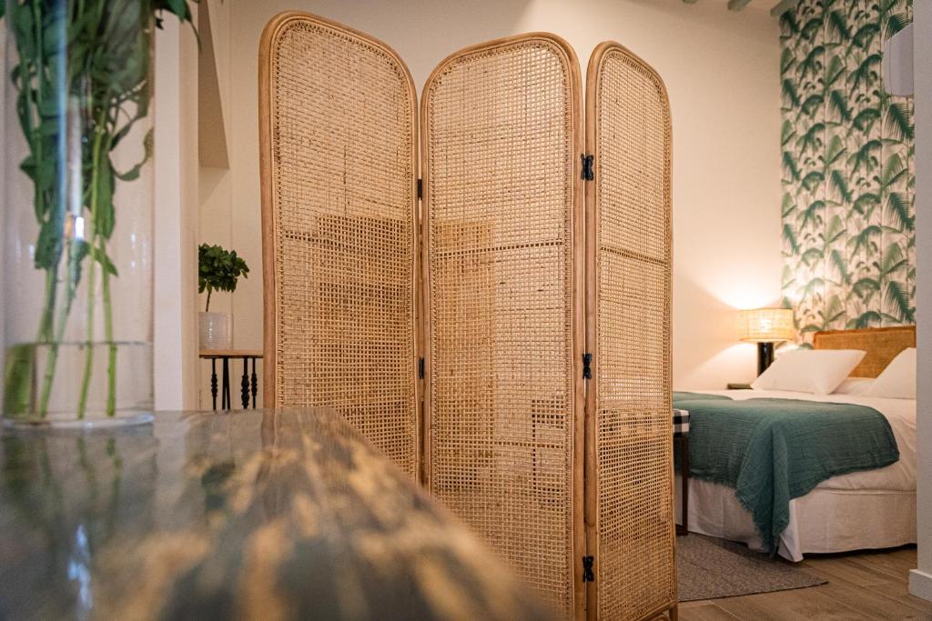 Posteľ alebo postele v izbe v ubytovaní La Casa del Pintor Apartments