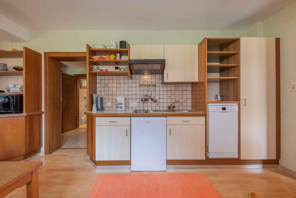 Kuchyň nebo kuchyňský kout v ubytování Appartements-Klaus