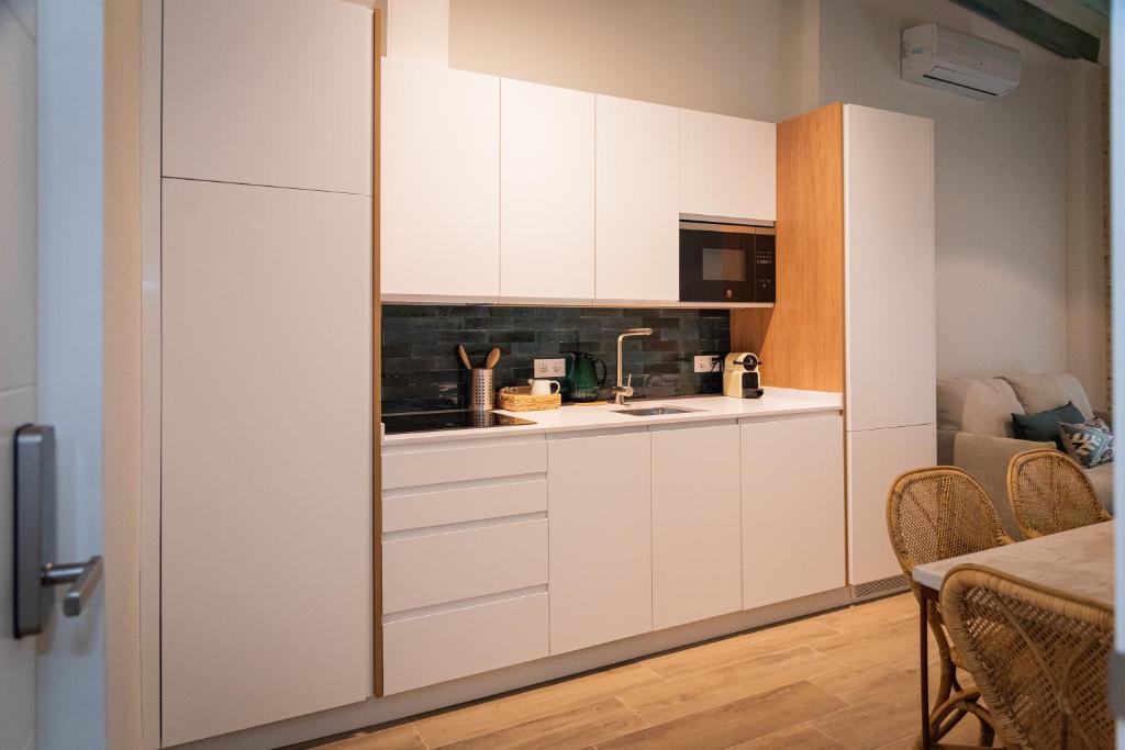 Kuchyňa alebo kuchynka v ubytovaní La Casa del Pintor Apartments
