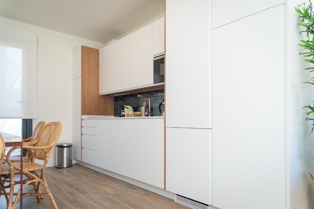 Kuchyňa alebo kuchynka v ubytovaní La Casa del Pintor Apartments