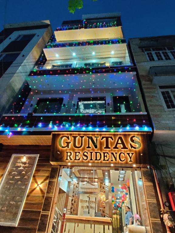 a building with a sign that reads guinaresres residency at GUNTAS RESIDENCY in Amritsar
