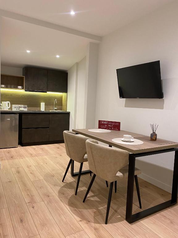 Kuchyň nebo kuchyňský kout v ubytování Living Studio Apartments
