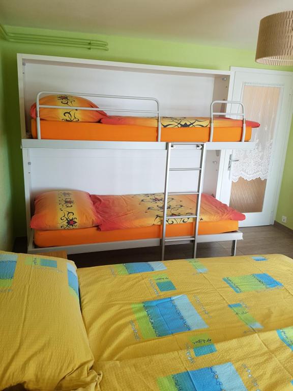 Postel nebo postele na pokoji v ubytování appartement "bellevue"