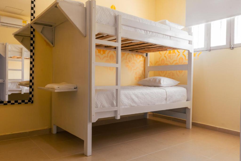 Postel nebo postele na pokoji v ubytování San Felicin Hostel