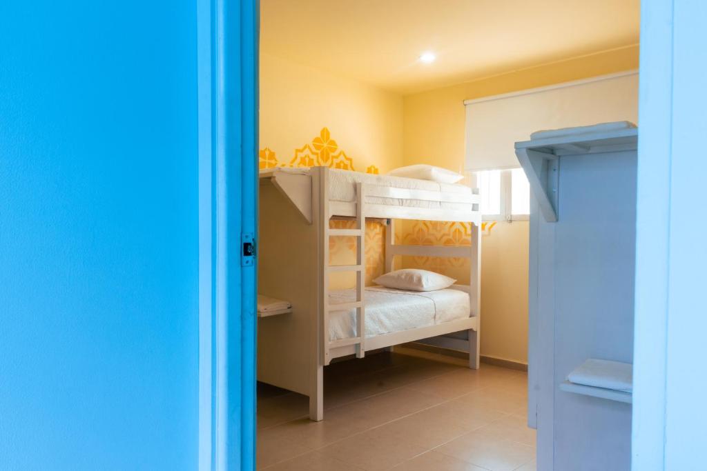 Postel nebo postele na pokoji v ubytování San Felicin Hostel