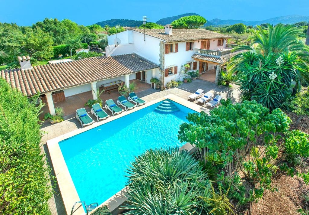 an aerial view of a house with a swimming pool at Owl Booking Villa La Font - Relax with a Big Pool in Pollença