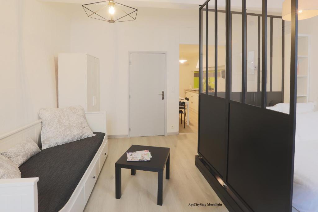 Postel nebo postele na pokoji v ubytování AptCityStay