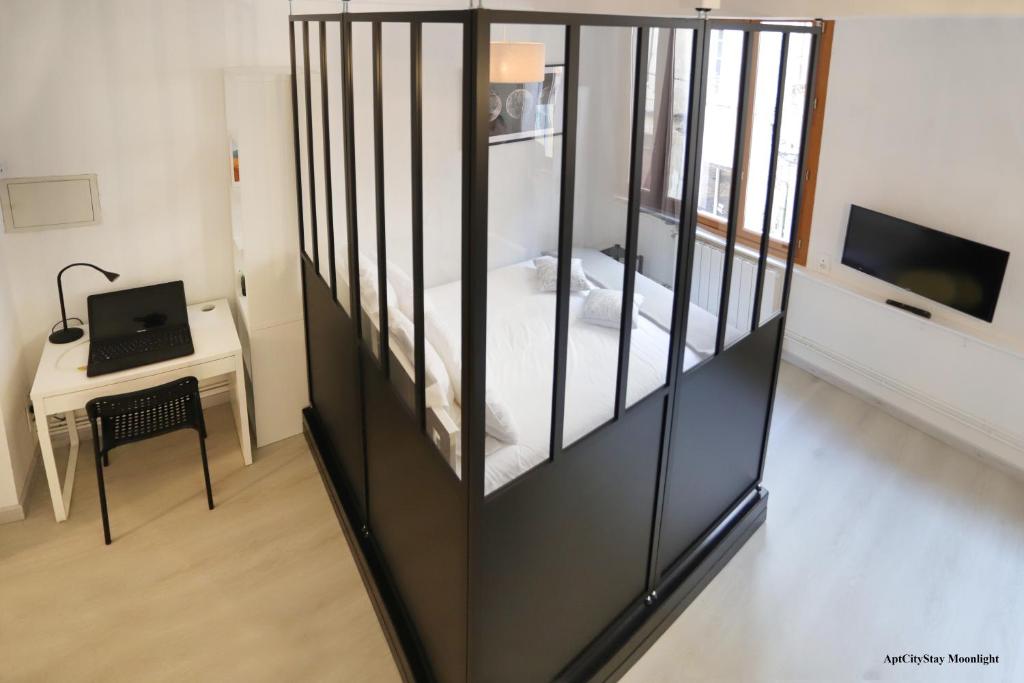 TV a/nebo společenská místnost v ubytování AptCityStay
