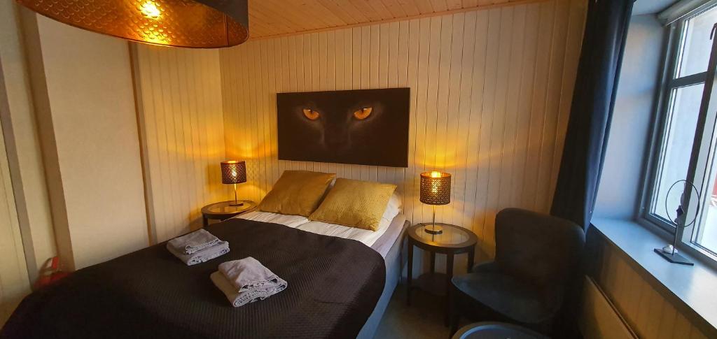 Postel nebo postele na pokoji v ubytování Nyksund Ekspedisjonen