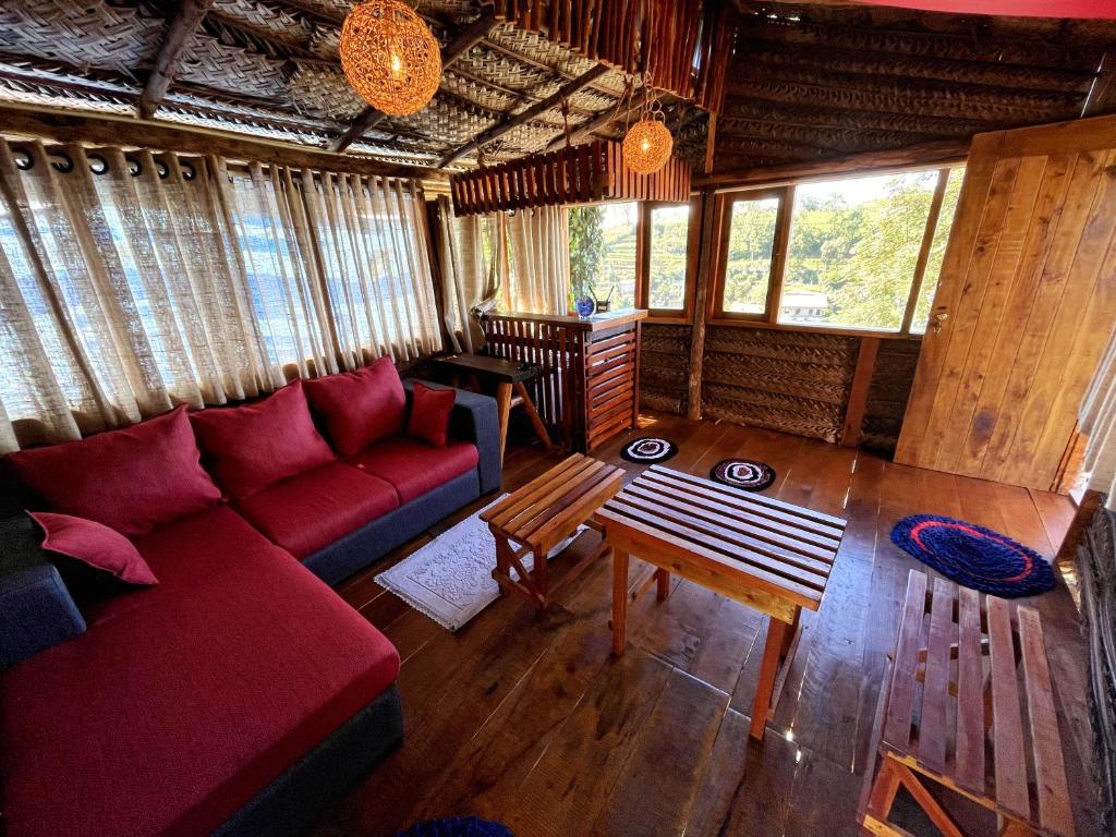 Posezení v ubytování La Luna Cabins